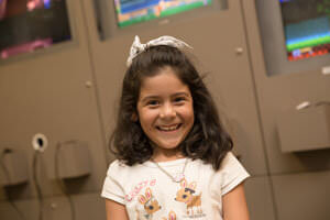 child smiling waiting room